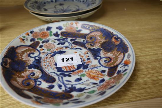 A pair of Chinese Imari plates and a dish